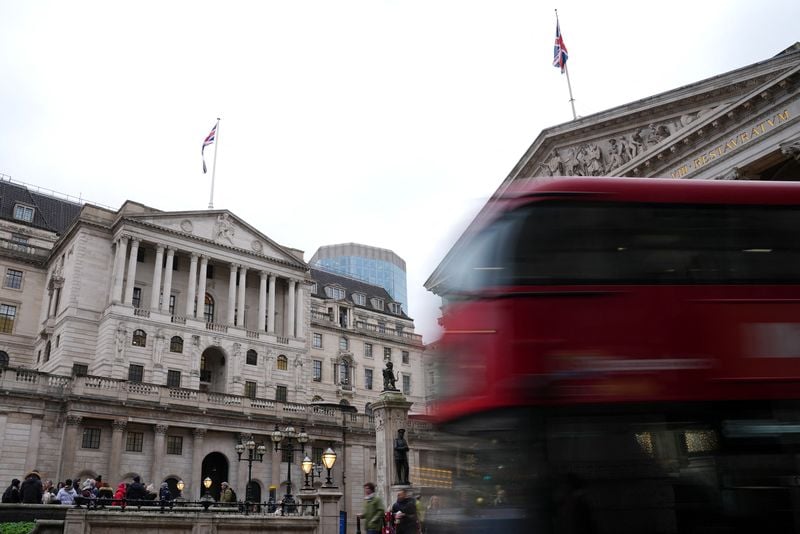 Image for Bank of England cuts rates in tight vote, sterling rises