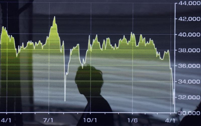 Image for Shares hit record high, oil plummets with market sentiment buoyed by Iran-Israel truce