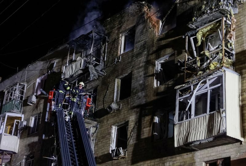 Image for Drone hits apartment building in Ukraine's Kharkiv, injures seven, mayor says