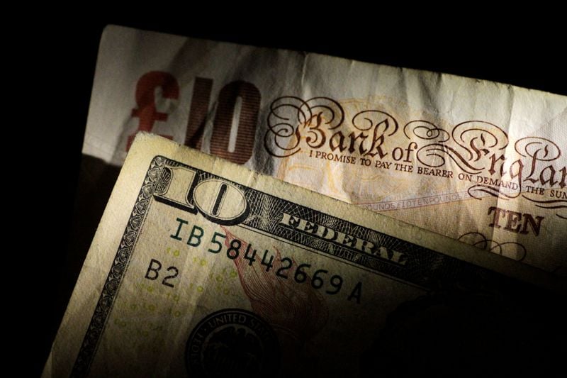 Image for Sterling ticks higher as strong data, trade deal buffer against stronger dollar