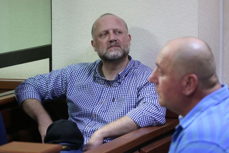 Image for Georgia jails three opposition politicians, including bank founder