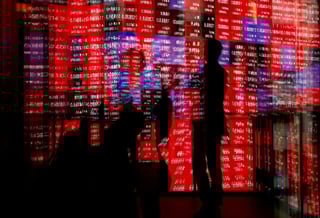 Image for Asia shares hesitant, dollar slips amid tariff confusion