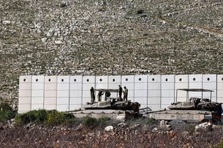 Image for Exclusive-Hezbollah returns to guerrilla roots, awaits Israeli invasion