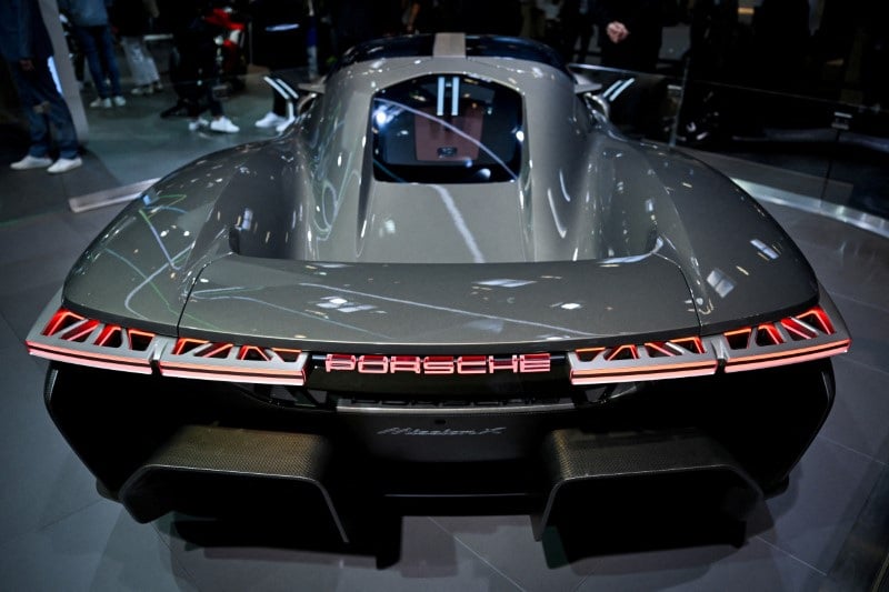 Image for Porsche's earnings per share slashed by a third in 2024, keeps dividend stable