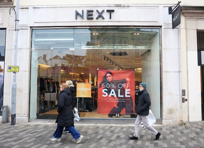 Image for UK's Next lifts profit outlook as warm weather, M&S disruption boost trade