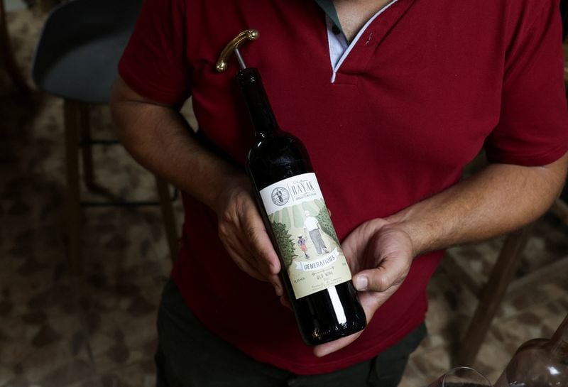Image for Lebanese winemaker strains to keep business alive through war and drought