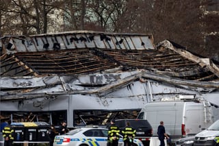 Image for Police detain fourth suspect after arson attack on Czech defence factory