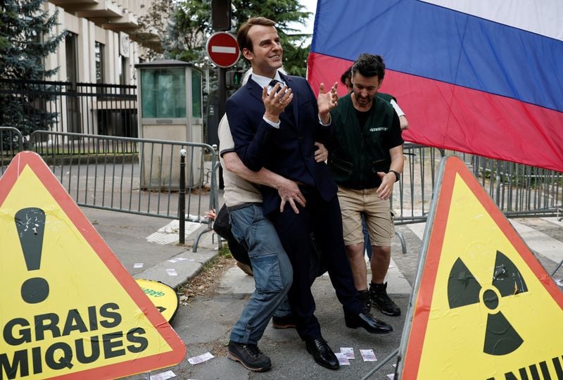 Image for Greenpeace removes wax statue of Macron over French trade with Russia