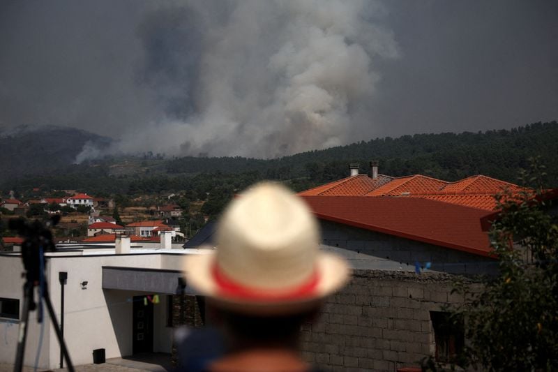Image for Wildfires kill three across southern Europe, force thousands to evacuate