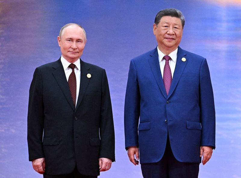 Image for Putin thanks Xi, his 'dear friend', for warm welcome to China