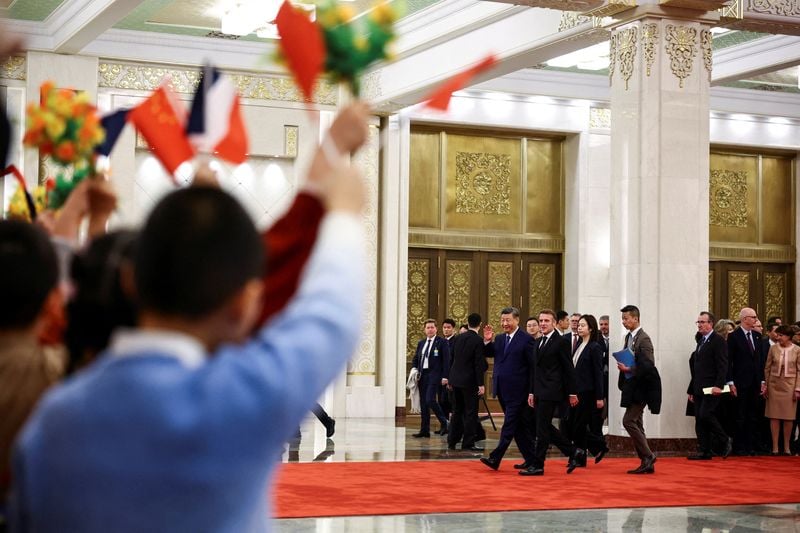 Image for Macron urges Xi to help correct 'unsustainable' global trade imbalances