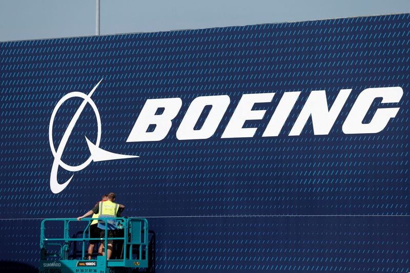 Image for Boeing's quarterly loss shrinks as jet deliveries rebound, but shares drop