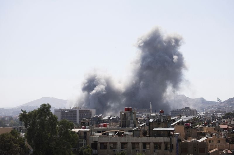 Image for Israel launches heavy airstrikes in Damascus, vowing to protect Druze