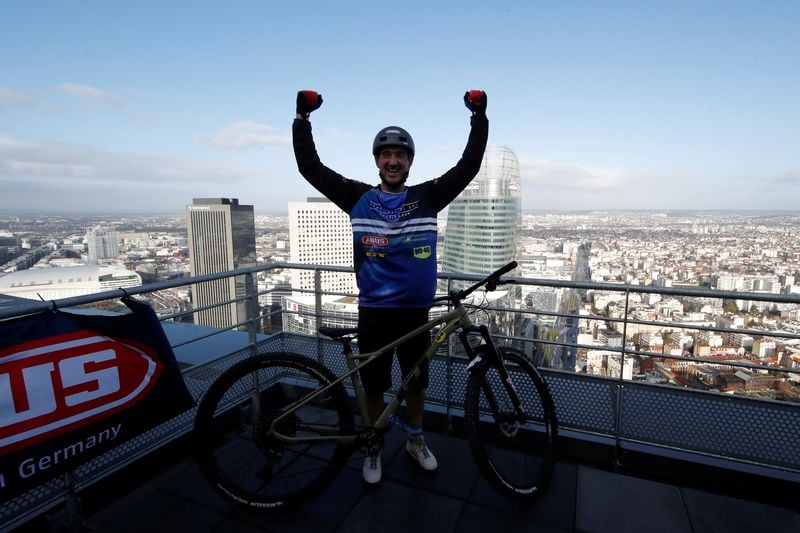 Image for Social media star Fontenoy breaks world record cycling up Eiffel Tower