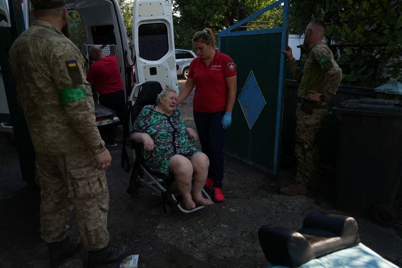 Image for As Russia advances, Ukrainians flee once-sleepy mining town