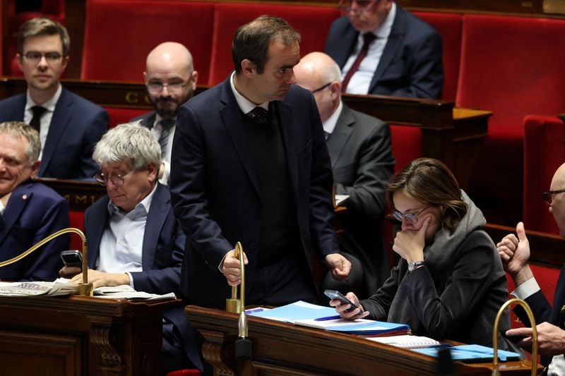 Image for French government survives no-confidence votes, now faces another budget battle