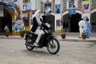 Image for Analysis-Soaring costs, fuel shortage fears drive Pakistan to electric motorbikes