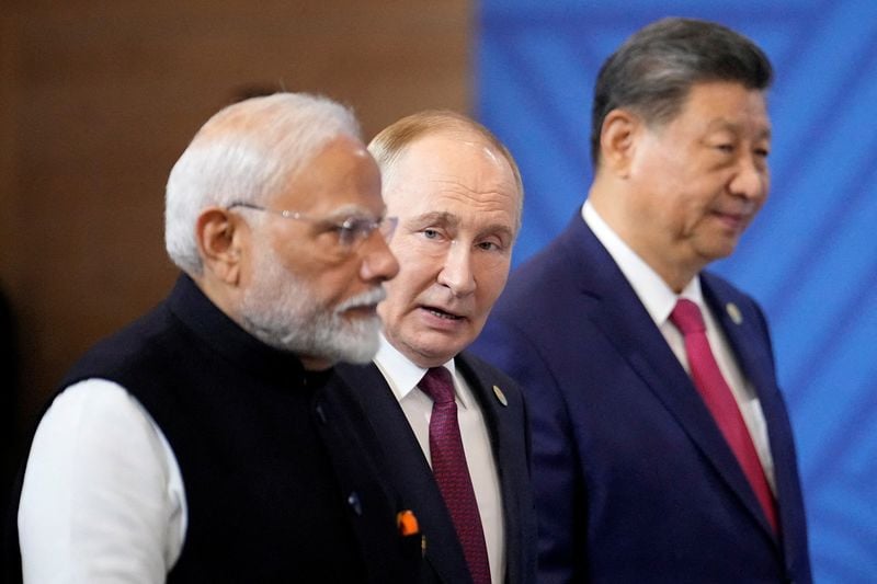 Image for 'Powerful optics': China's Xi to welcome Putin, Modi in grand show of solidarity