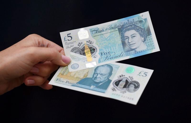 Image for Sterling rises against shutdown-focussed dollar; set for fourth monthly loss on euro