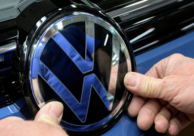 Image for VW production continuing for now but chip uncertainty high, source says