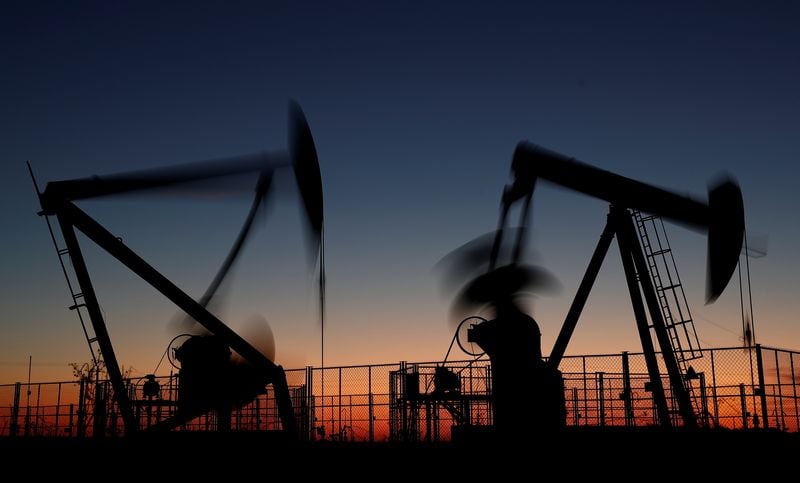 Image for Oil holds steady at multi-week high as Russia limits fuel exports, US GDP revised up