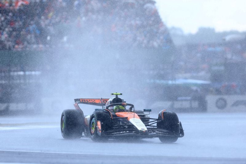 Image for Motor racing-Norris wins in the wet as Piastri fumes and Hulkenberg stuns