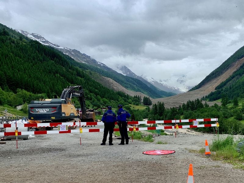 Image for Body found in search of Swiss village buried by glacier debris