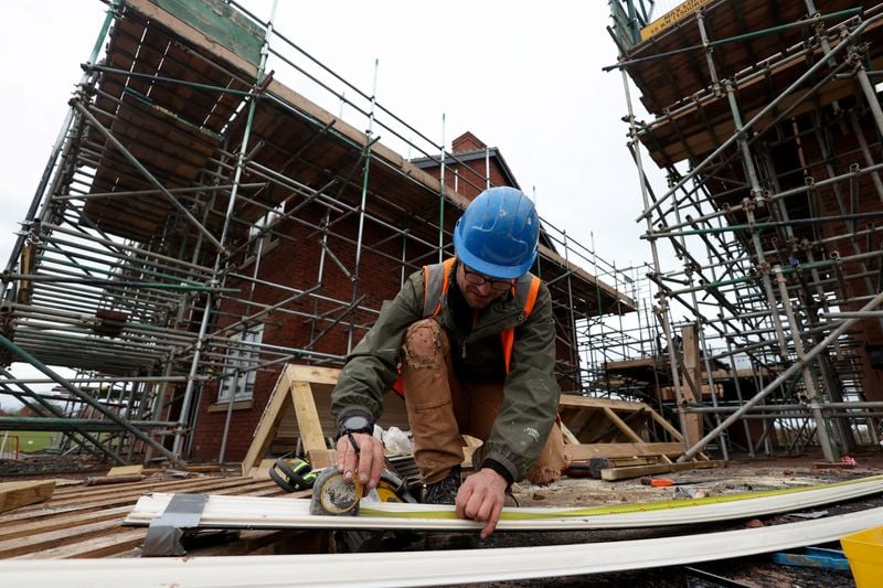 Image for UK housing market stumbles, employers lose confidence on budget worries