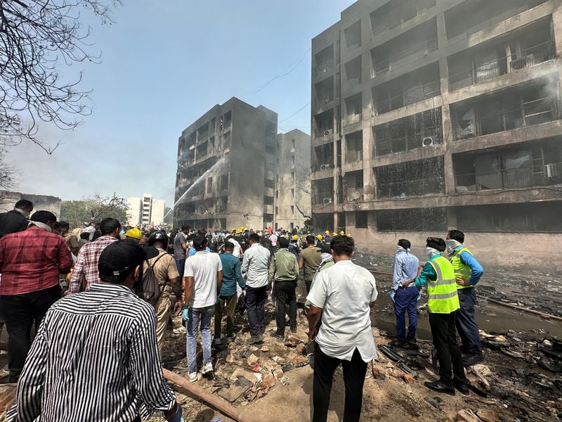 Image for Survivor of Air India crash jumped out of emergency exit, police say