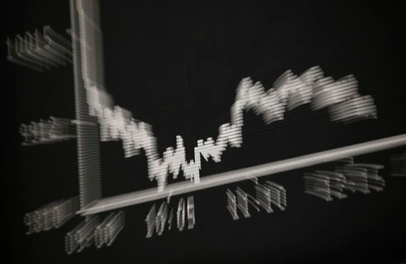 Image for UK stocks close lower as tech, utility shares drag