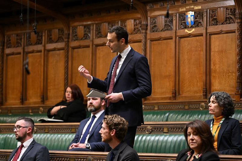 Image for UK minister quits despite being cleared over alleged investigation of journalists