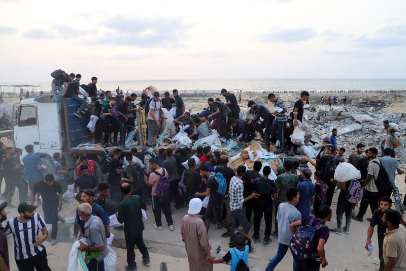 Image for Britain warns Israel it could recognise Palestinian state as Gaza starvation spreads