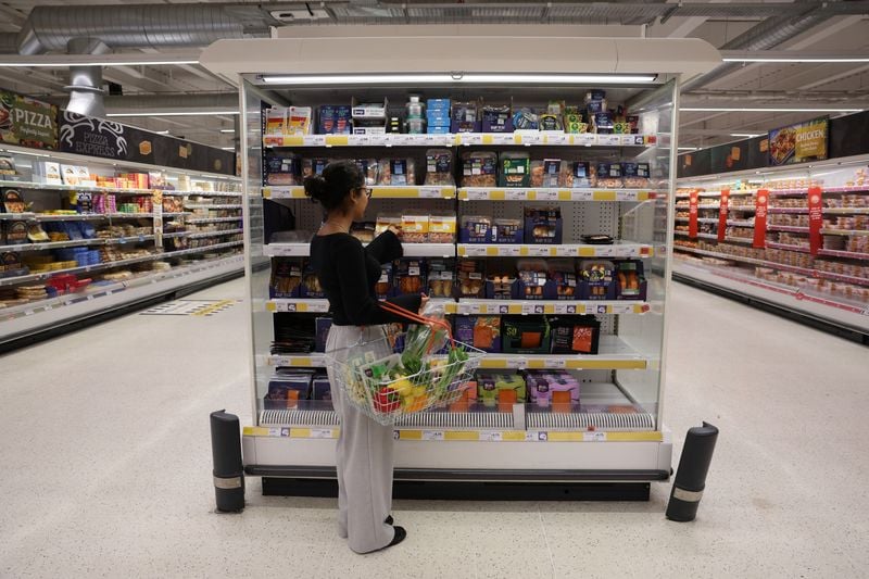Image for UK consumers turn a little less gloomy in May, GfK survey shows