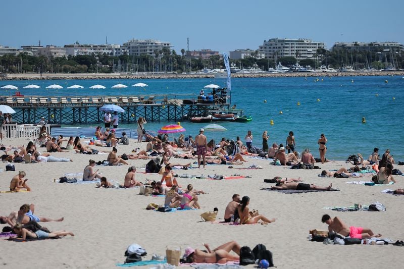 Image for France to ban smoking at beaches, parks and outside schools to protect children