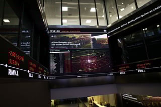 Image for London's FTSE 100 edges lower as utilities and miners weigh