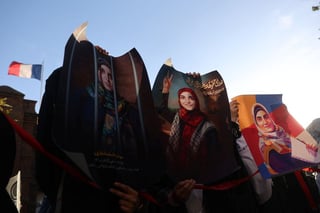 Image for Female Iranian student arrives in Iran after release in France, state TV reports