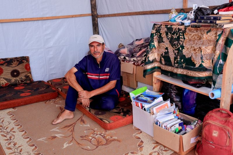 Image for A professor in Gaza braves bullets and bodies to reach Israeli-approved aid