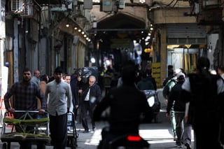 Image for War hits Tehran’s grand bazaar as prices surge and shops shut