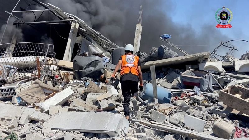 Image for Israeli strikes kill 30 in Gaza, including rescue service official and local journalist