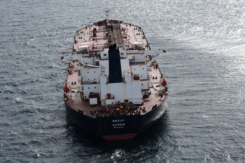 Image for Oil up as investors balance sanctions risks, oversupply worries