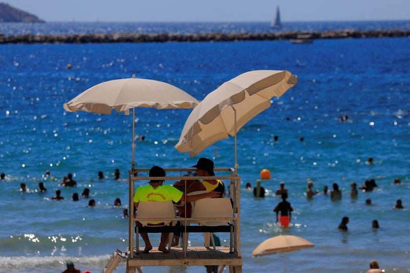 Image for Heatwave across Europe leaves 8 dead as early summer temperatures hit records
