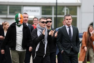 Image for UK prosecutors lose appeal to reinstate terrorism charge against Kneecap rapper