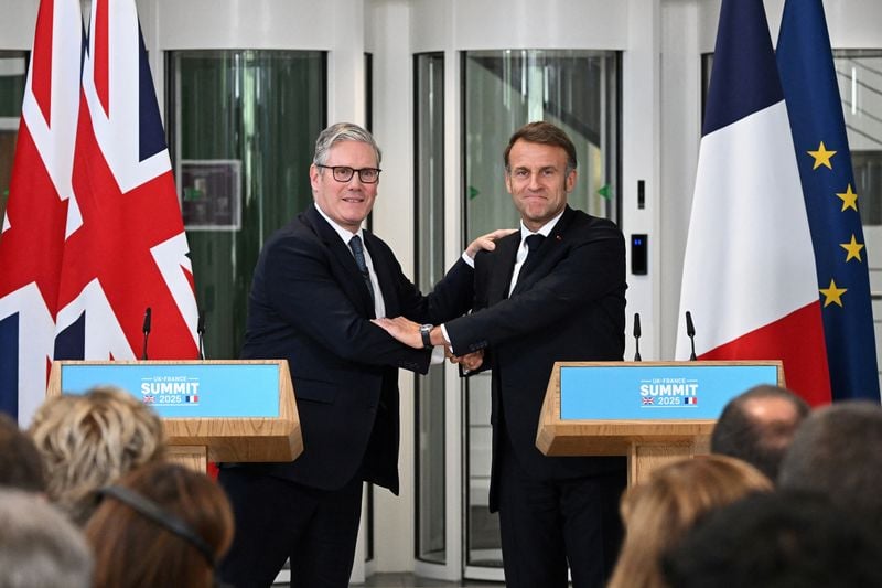 Image for UK to start implementing migrant returns deal with France within days