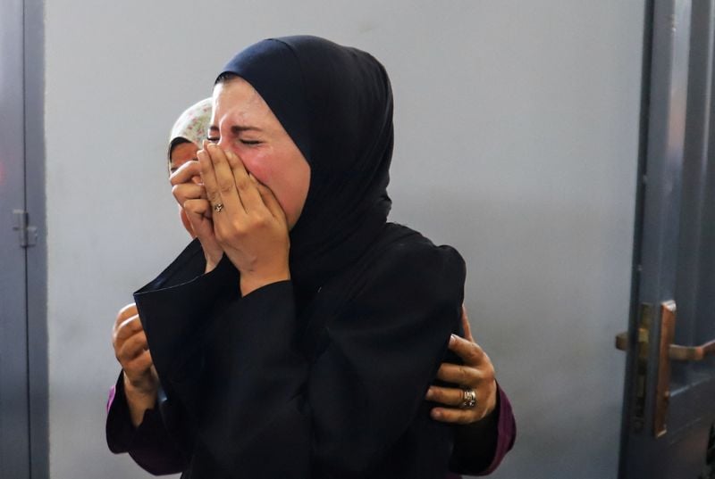 Image for As death toll rises, Gazans make life-risking journeys to seek food