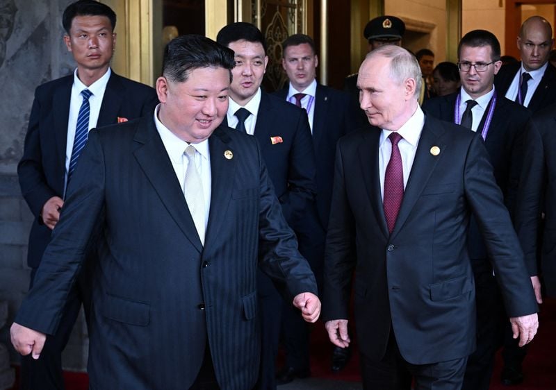 Image for Putin invites North Korea's Kim to Russia after holding talks in Beijing with him