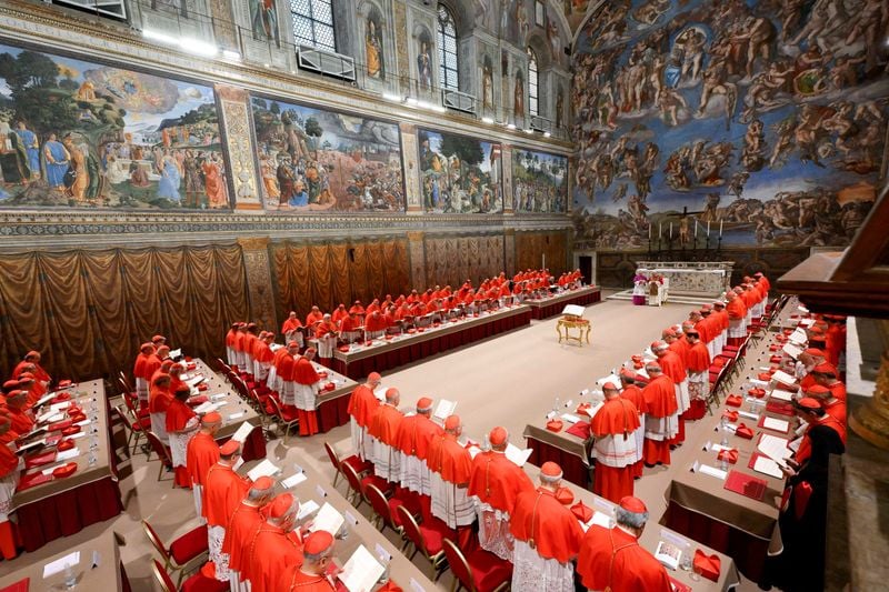 Image for Cardinal found with phone during secret conclave to elect Pope Leo, book says