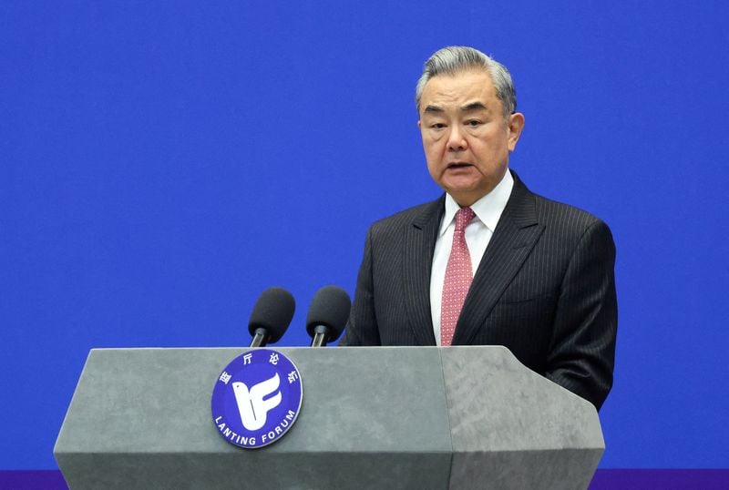 Image for China's foreign minister urges France to support its position on Japan
