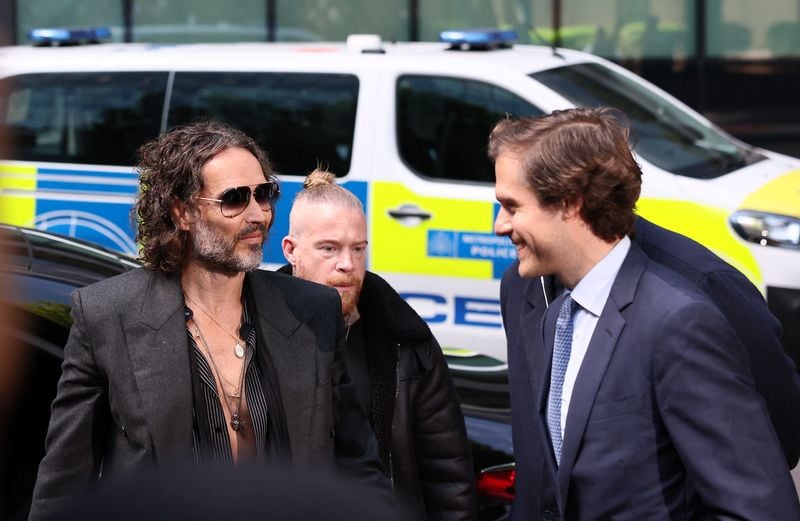 Image for Comedian Russell Brand denies rape and sex assault charges in UK court