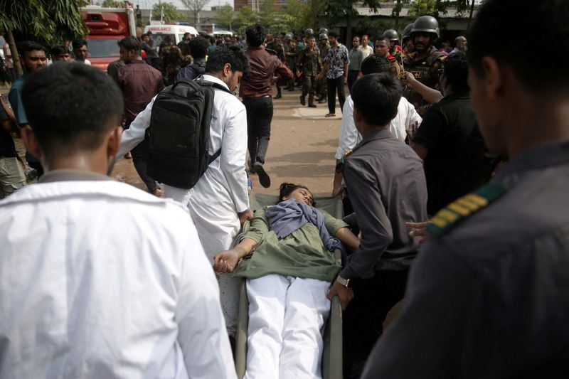 Image for Students protest in Bangladesh after air force jet crash kills 31, mostly children