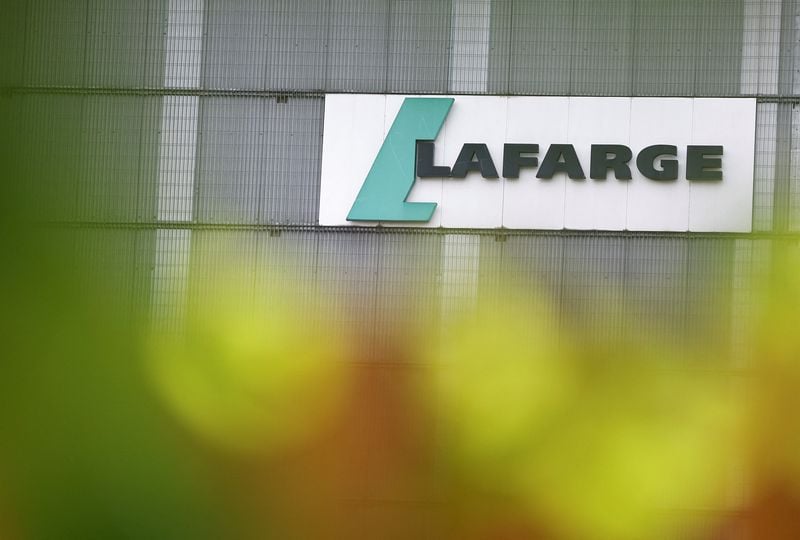 Image for French cement maker Lafarge found guilty of financing jihadists in Syria